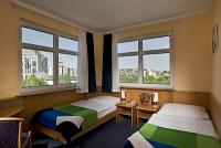 Sypialnia dwuosobowa w Hotelu Budapest Business w sercu miasta